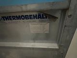 a metal door with a sign on it that says thermobbal