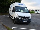 a white van that is parked in a parking lot