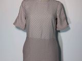 a close up of a dress on a mannequin mannequin mannequin mannequin mannequin mannequin mannequin mannequin