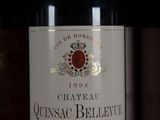 a bottle of wine that is sitting on a table