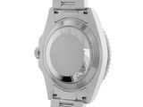 the watch is silver and has a black face