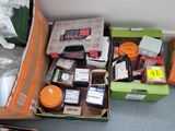 a box full of assorted items sitting on the floor