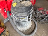 many tools that are sitting on the floor in the garage