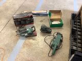 many tools that are sitting on the floor in the room