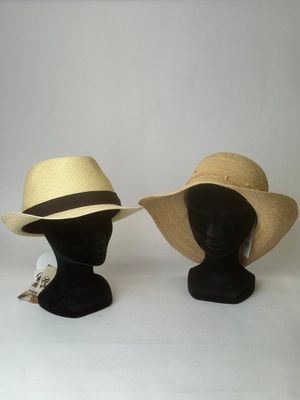 two hats on a mannequin head on a white background