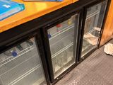 a counter with two glass doors and a book on it