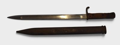 two different types of knives on a white surface