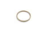a gold ring on a white background