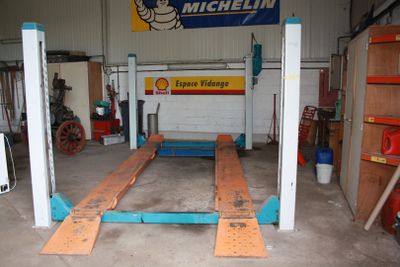 a picture of a garage with a lot of tools in it