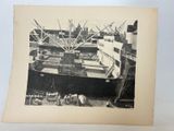 a black and white photo of a ship in the water