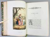 an open book with a picture of a group of people on it
