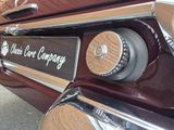a close up of a car ' s emblem on the side of the car