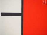 red, white, and black painting on a wall in a room