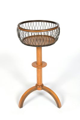 an image of a wooden table with a basket on it