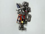 an image of a pin with a man holding a sword