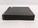 an open dvd player sitting on top of a white table