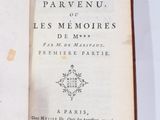 an open book with a picture of a bird on it ' s cover