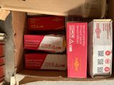 a cardboard box full of boxes and boxes on the floor