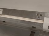 a picture of a stainless steel shelf with a price tag on it