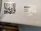 a close up of a piece of paper with a qr code on it