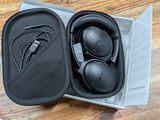 a pair of headphones in a case on a table