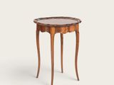 a small wooden table with a glass top on a white background