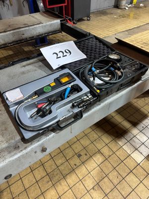 a table with a bunch of tools on it