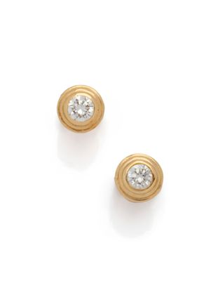a pair of diamond stud earrings