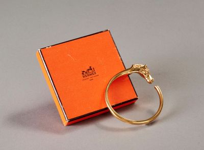 HERMES Paris "Galop" Bracelet en métal doré modèle Galop