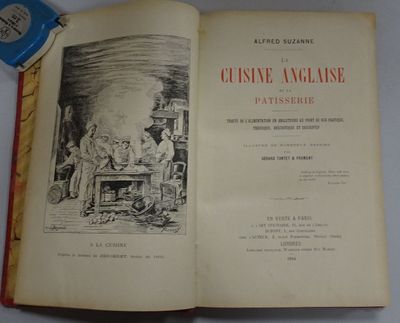 a book with a picture of a group of people sitting around it