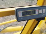 a digital clock on the back of a construction vehicle