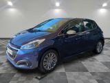 la photo d'une voiture bleue garée dans un garage