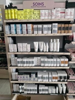 many different types of skin care products on the shelves