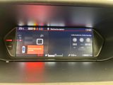 an image of a car dashboard with a digital display