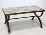 a small table with a tile top on a white floor
