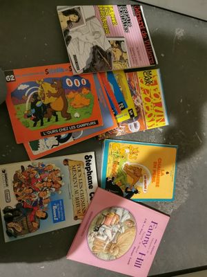 many children ' s books on the table together