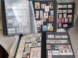 many different types of stamps on display on a table