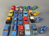 a lot of toy cars that are on the table