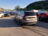 a lot of cars that are parked in a parking lot