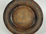 an image of a decorative plate on a stand on a white background
