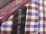 a close up of a shirt with a label on it