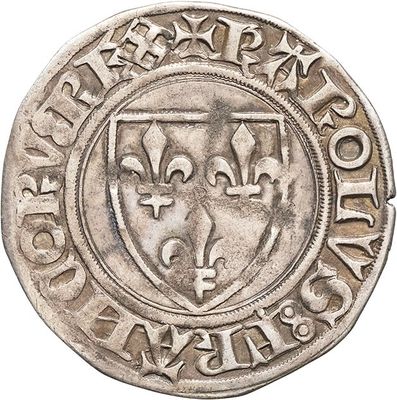 a close up of a silver coin with a coat of arms on it