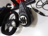 a steering wheel and a steering wheel on a table