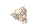 a close up of a brooch with diamonds on a white background