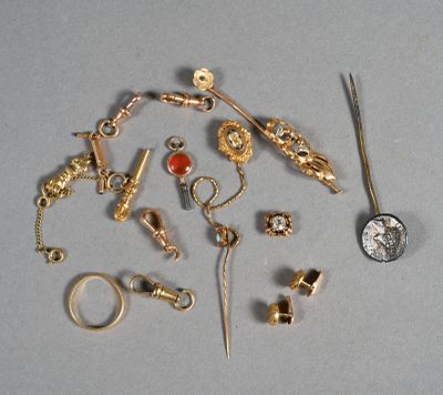 a lot of gold and silver jewelry on a table