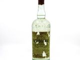 a bottle of liquor that is sitting on a table