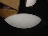 a white light that is sitting on a black surface