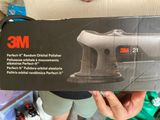 someone is holding a box of 3m power tools in their hands