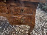 an old wooden desk with drawers and drawers on top of it