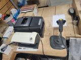an image of a desk with a printer and other items on it